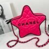 Chanel 24C Fuchsia Satin Walk of Fame Star Bag with Black Lacquered Hardware.