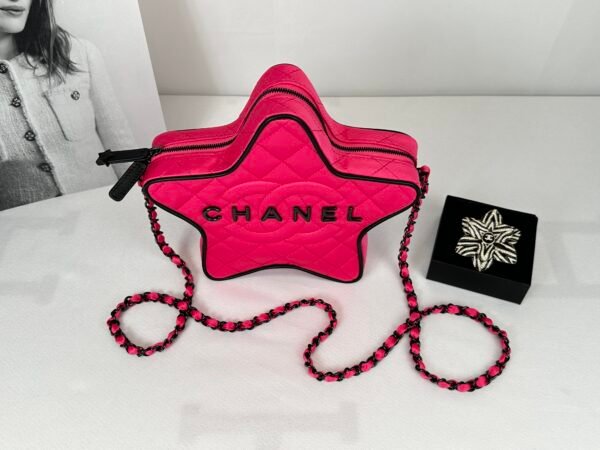 Chanel 24C Fuchsia Satin Walk of Fame Star Bag with Black Lacquered Hardware.