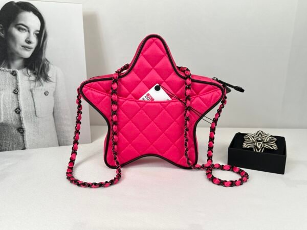 Chanel 24C Fuchsia Satin Walk of Fame Star Bag with Black Lacquered Hardware.
