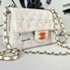 Chanel 24C White Tweed Mini Flap with Orange Enamel CC and Champagne Gold Hardware.