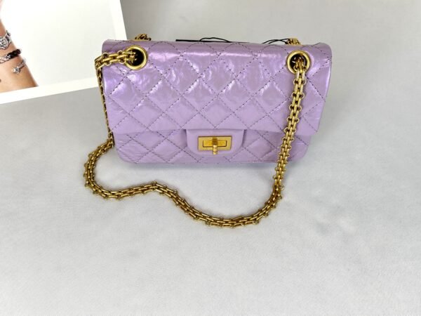 Chanel 24P Light Purple Aged Calfskin Mini Reissue with Matte Gold Hardware.