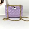 Chanel 24P Light Purple Aged Calfskin Mini Reissue with Matte Gold Hardware.