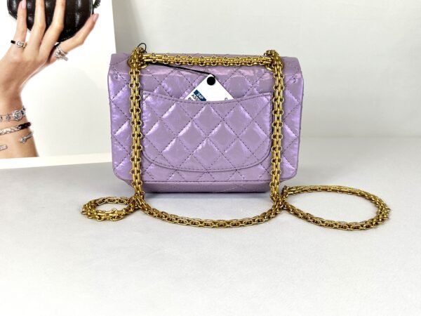 Chanel 24P Light Purple Aged Calfskin Mini Reissue with Matte Gold Hardware.