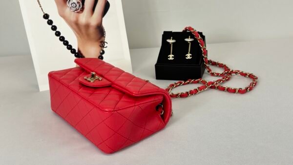 Chanel 24S Dark Red Lambskin  Rectangular Mini with Champagne Gold Hardware.