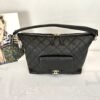 Chanel 23B Black Coco Mellow Small Hobo Bag.