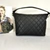 Chanel 23B Black Coco Mellow Small Hobo Bag.