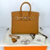 Hermès Gold Togo Birkin 25 with Palladium Hardware.
