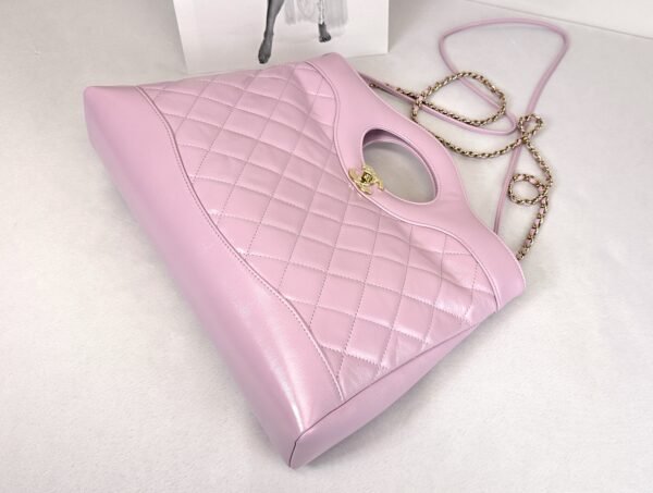 Chanel 24S Light Purple Shiny Lambskin Medium 31 Bag with Champagne Gold Hardware.