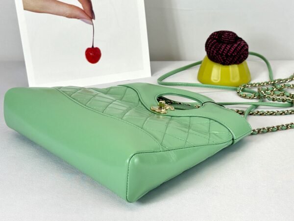 Chanel 24S Green Shiny Lambskin Mini 31 Bag with Champagne Gold Hardware.