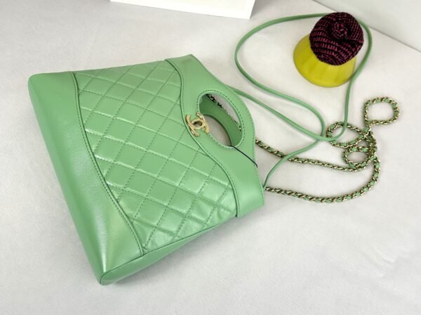 Chanel 24S Green Shiny Lambskin Mini 31 Bag with Champagne Gold Hardware.