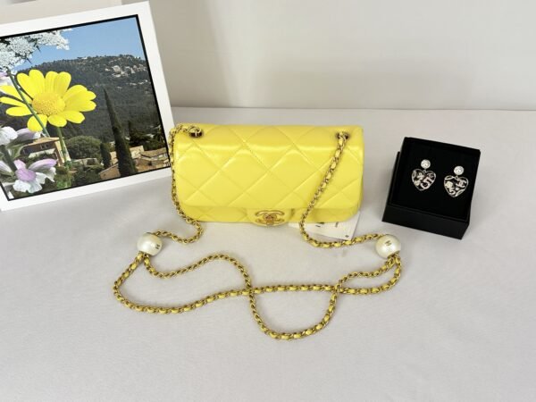 Chanel 24S Yellow Iridescent Lambskin Pearl Twin Flap Bag.
