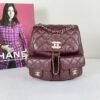Chanel 24A Burgundy Caviar Medium Duma Backpack.