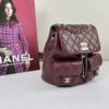 Chanel 24A Burgundy Caviar Medium Duma Backpack.