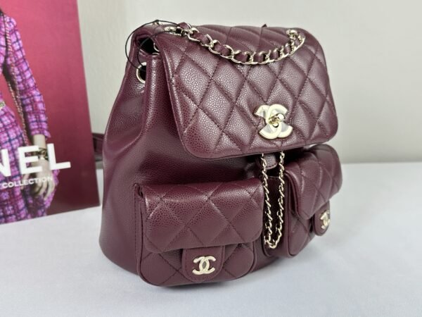 Chanel 24A Burgundy Caviar Medium Duma Backpack.