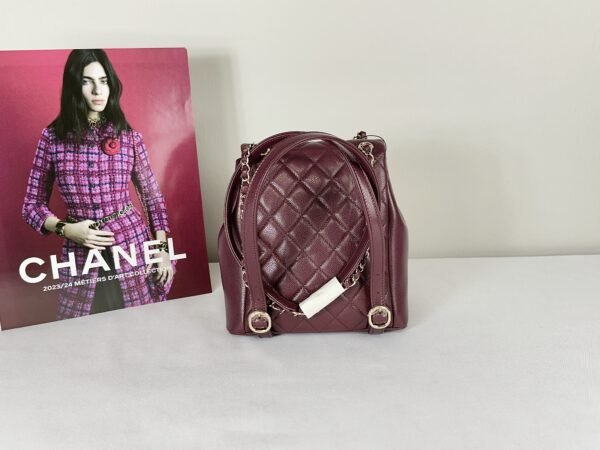 Chanel 24A Burgundy Caviar Medium Duma Backpack.