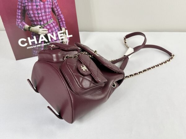 Chanel 24A Burgundy Caviar Medium Duma Backpack.