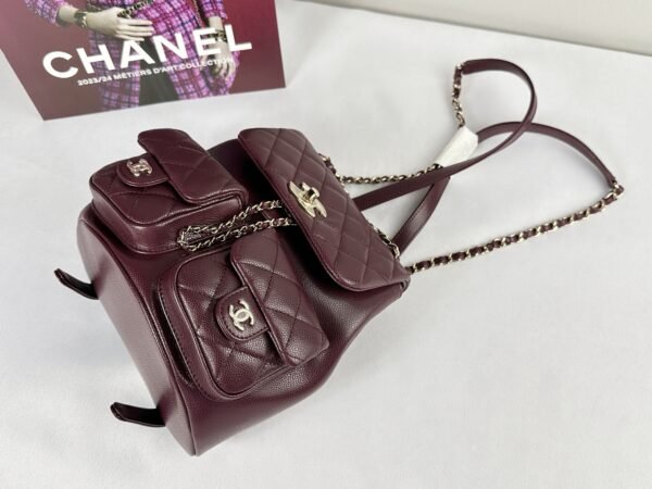 Chanel 24A Burgundy Caviar Medium Duma Backpack.