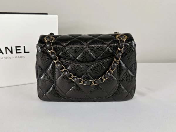 Chanel 24B Black Coco Caviar Square Mini with Bronze Hardware.