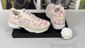Chanel 23S Pink Tweed Sneakers.