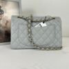 chanel 23B Grey Caviar Small Classic Flap with Champagne Gold Hardware.